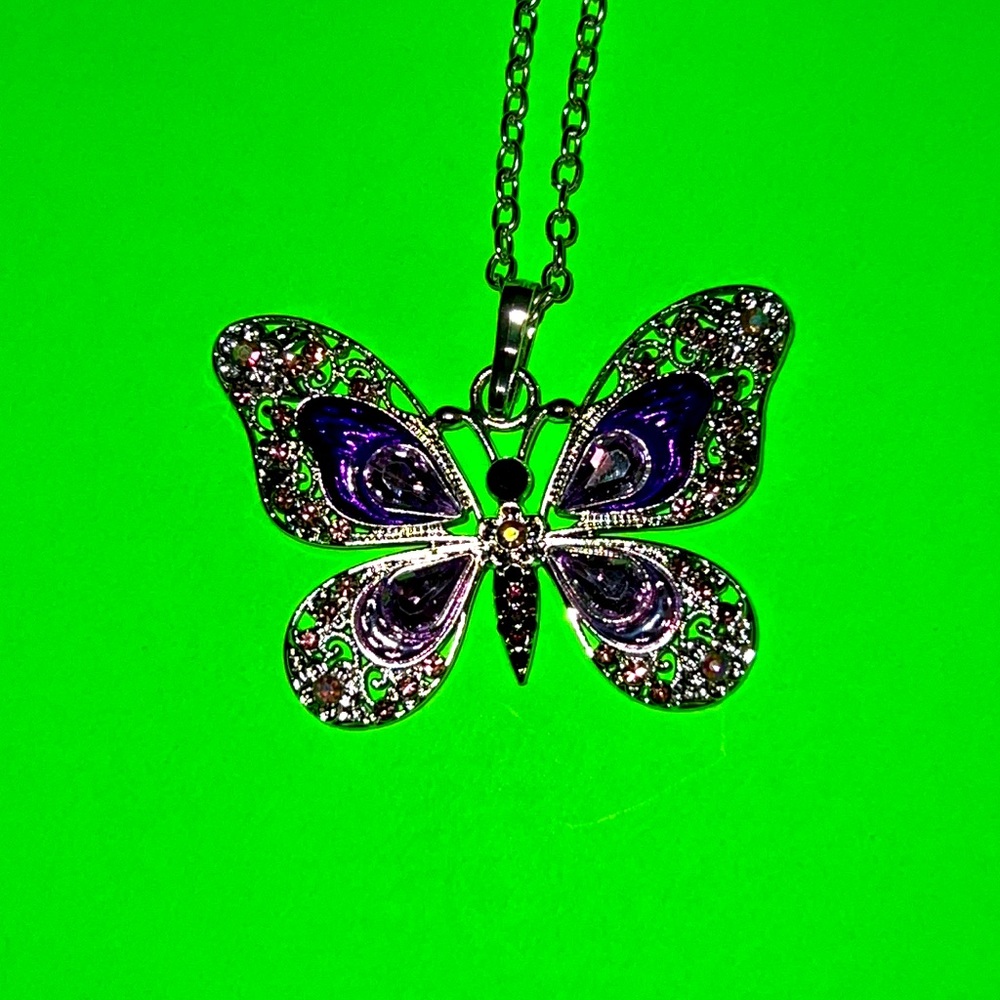 - Butterfly necklace. New.